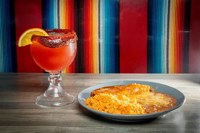Strawberry margarita and a creamy chimichanga