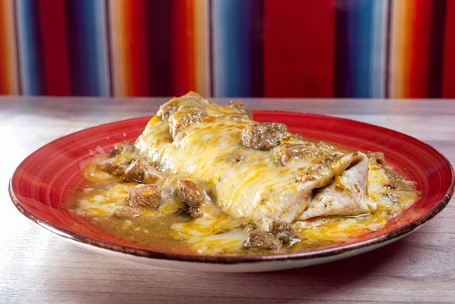 Fancy burrito smothered in chile verde and cheese