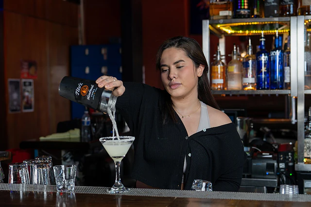 Bartender pouring a drink